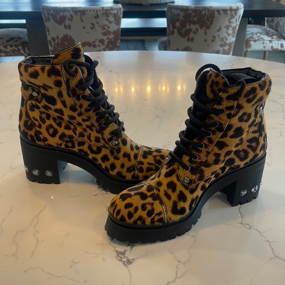 Selling these 💯 Authentic Miu Miu Cheetah combat ankle boots!